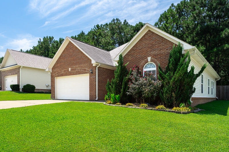 Front corner of the home with landscaping