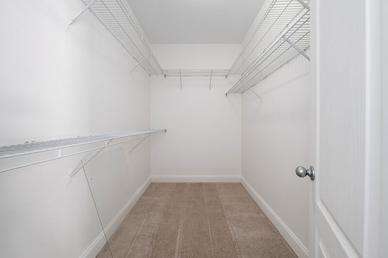 Walk-in closet with wire shelving